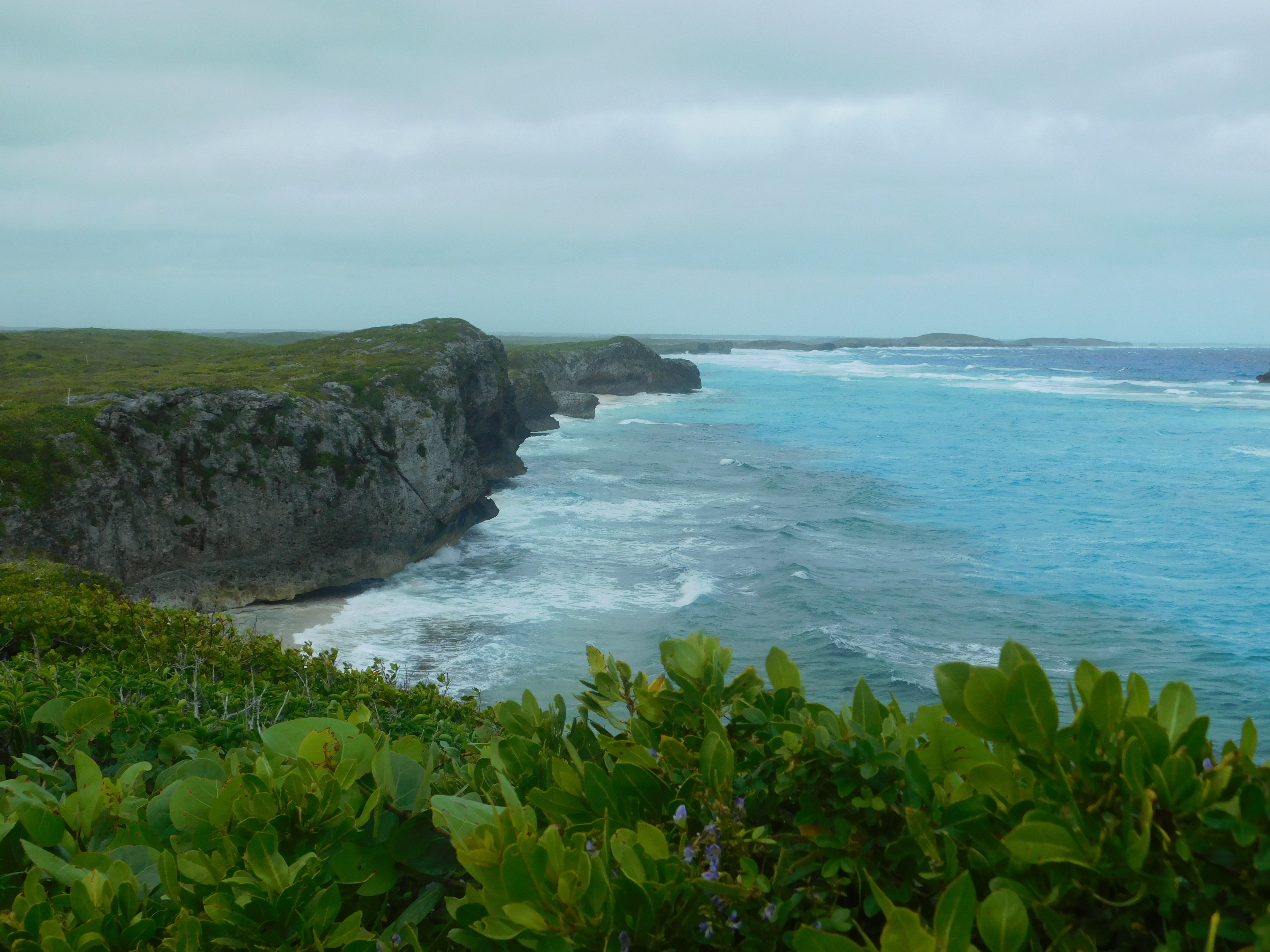 View from the top of the cliff in Mudjin in Middle Caicos. Turks & Caicos Island Guide - DIY Daytrip to North and Middle Caicos